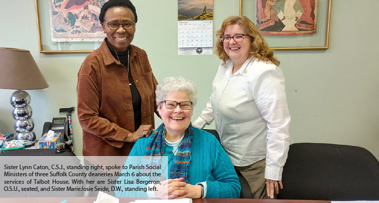 Sister Lynn Caton, C.S.J., standing right, spoke to Parish Social Ministers of three Suffolk County deaneries March 6 about the services of Talbot House. With her are Sister Lisa Bergeron, O.S.U., seated, and Sister MarieJosie Seide, D.W., standing left.